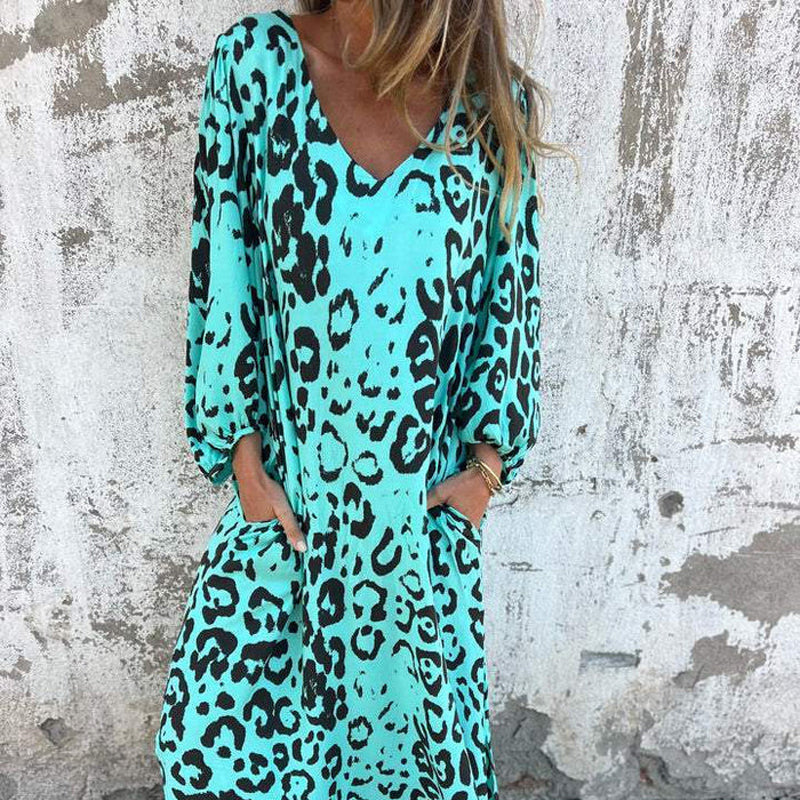 V-Ausschnitt fließendes Kleid mit Print und Taschen