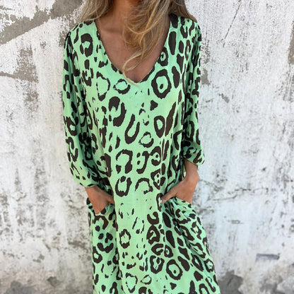V-Ausschnitt fließendes Kleid mit Print und Taschen