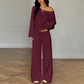 Damen-Outfit bestehend aus schulterfreiem Oberteil und Hose