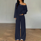 Damen-Outfit bestehend aus schulterfreiem Oberteil und Hose