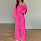 Damen-Outfit bestehend aus schulterfreiem Oberteil und Hose
