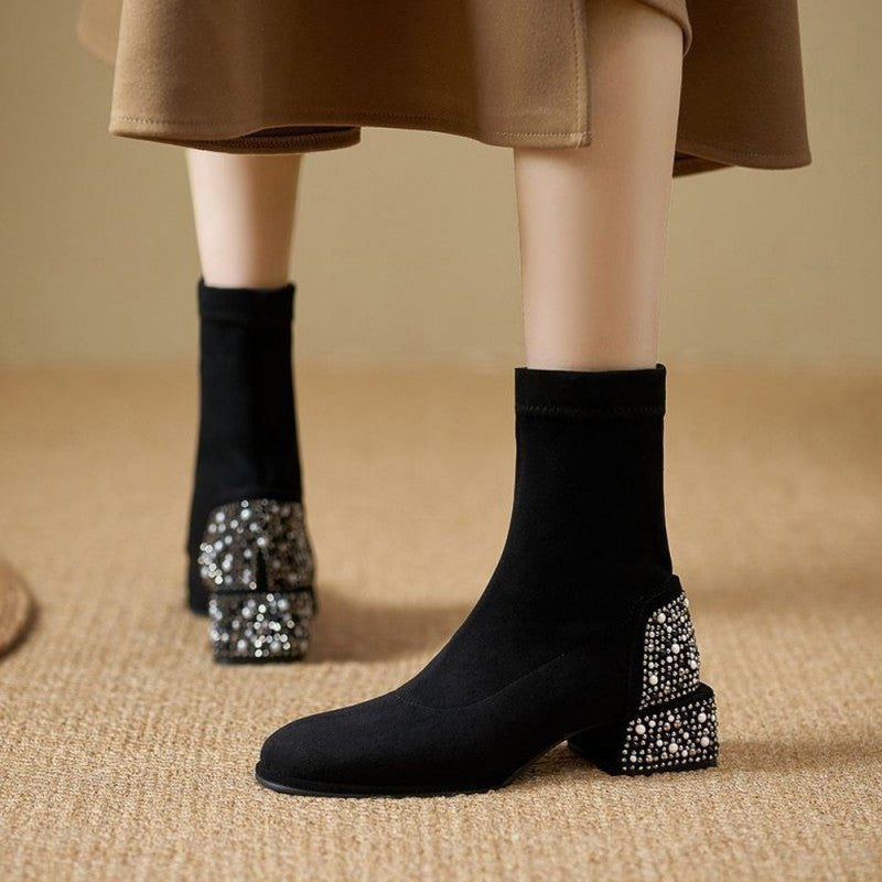 Stylische elegante glänzende Stiefeletten für Damen