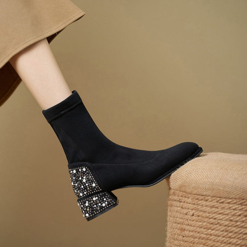 Stylische elegante glänzende Stiefeletten für Damen