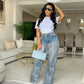 Damenjeans mit Pailletten und Quasten