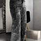 Damenjeans mit Pailletten und Quasten