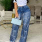 Damenjeans mit Pailletten und Quasten