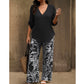 Set aus Damenbluse mit V-Ausschnitt und bedruckter Hose mit weitem Bein